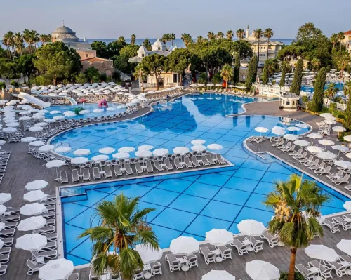 Comfortable private transfer from Antalya Airport to Swandor Hotels & Resorts Topkapı Palace in Kundu, with direct hotel drop-off.